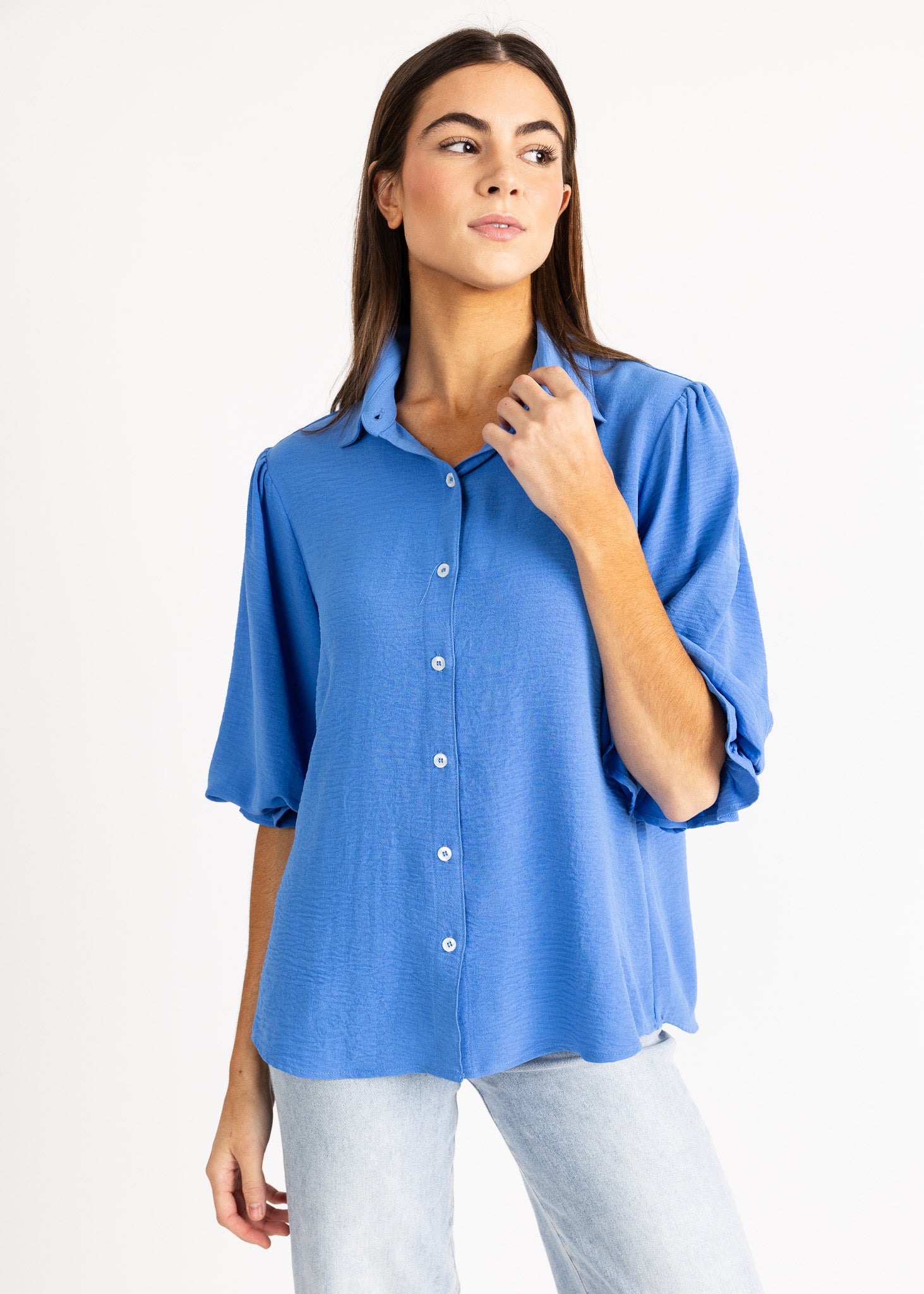 Yana K KESH TOP poly in vibrant color, featuring a stylish design and lightweight fabric for comfortable wear.