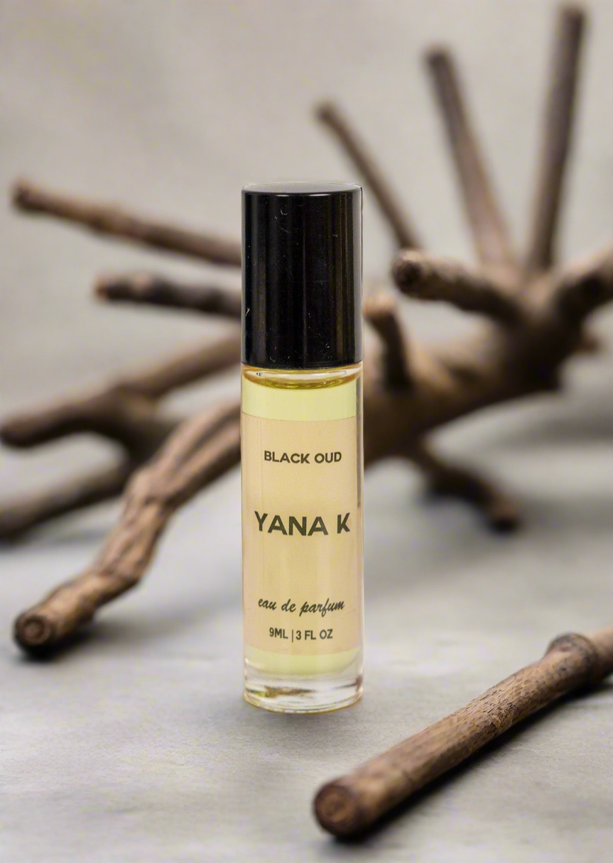 Yana K Black Oud Eau de Parfum bottle with elegant design and dark glass showcasing luxurious fragrance.