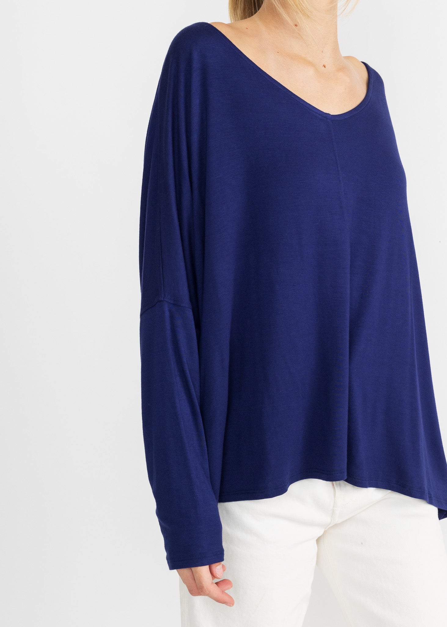 Yana K Lisa Top featuring a stylish design with a comfortable fit and elegant fabric draping.