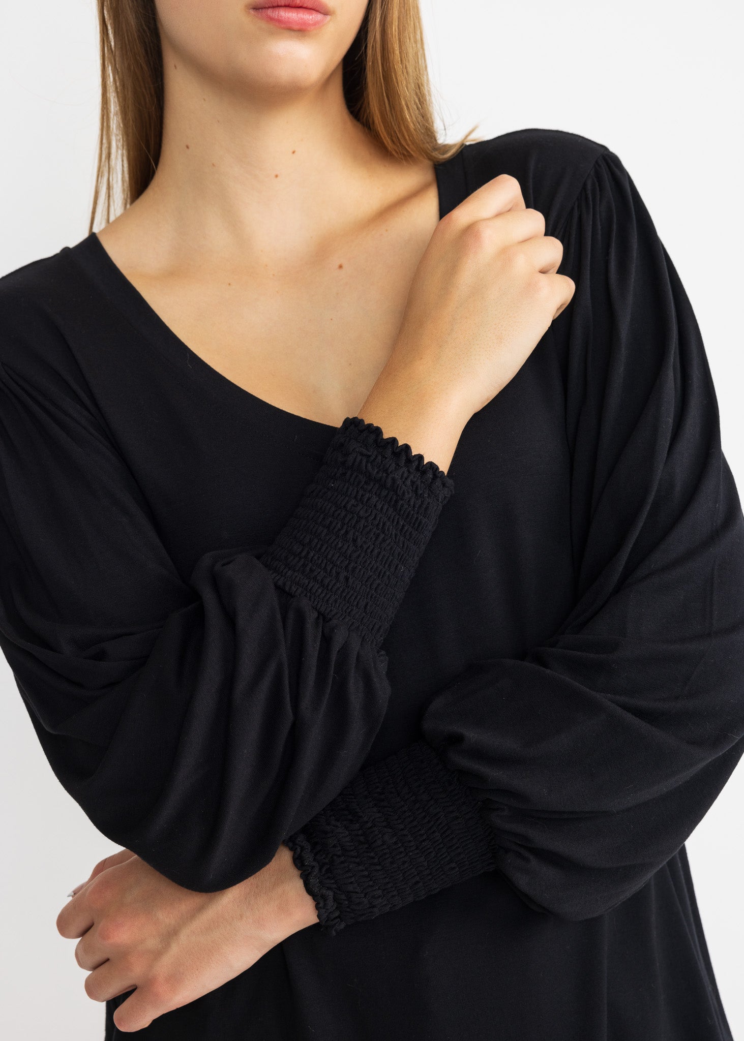 YanaK POLLY top in soft fabric, featuring a relaxed fit and elegant design, perfect for casual or dressy occasions.