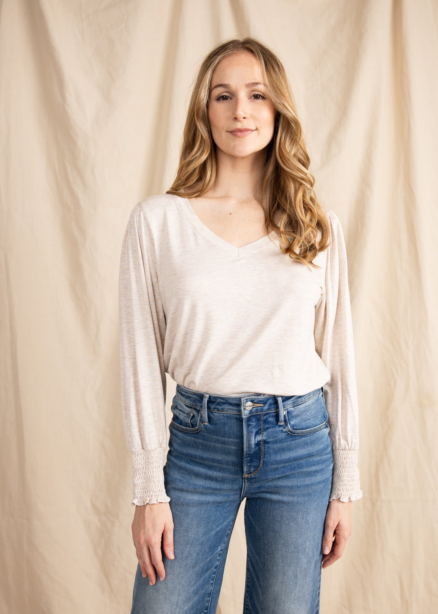 YanaK POLLY top in soft fabric featuring a relaxed fit and elegant neckline, perfect for casual or dressy occasions.