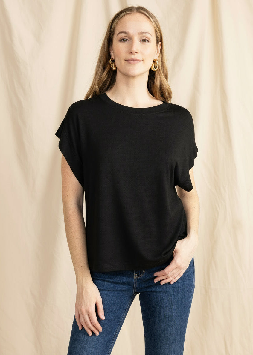 CLEMENTINE muscle tee top by YanaK in soft fabric, featuring a relaxed fit and sleeveless design for casual wear.