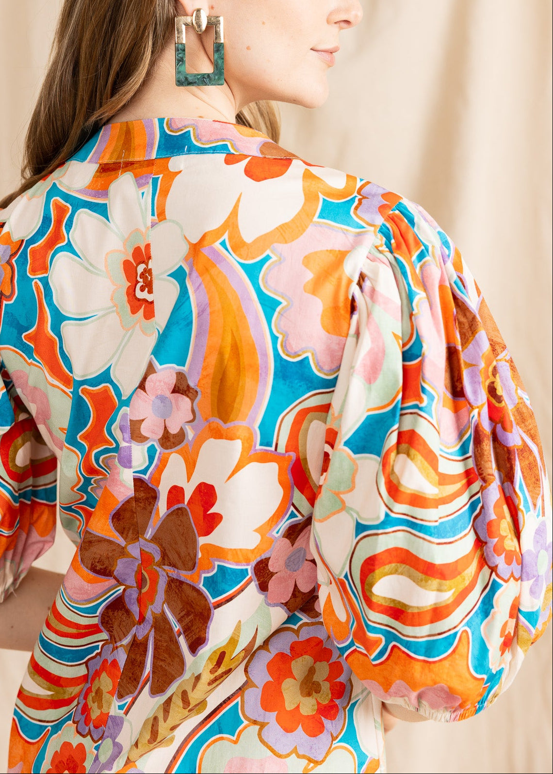 Yana K Moroccan mini dress featuring a vibrant pattern and flowing silhouette, perfect for casual outings or summer events.