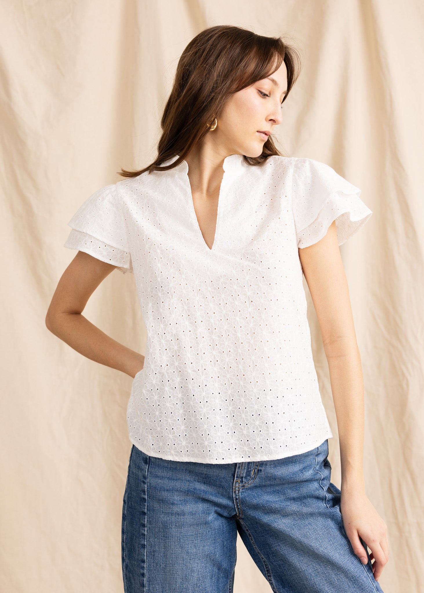Yana K georgette top featuring eyelet detailing, perfect for a stylish and breathable summer outfit.
