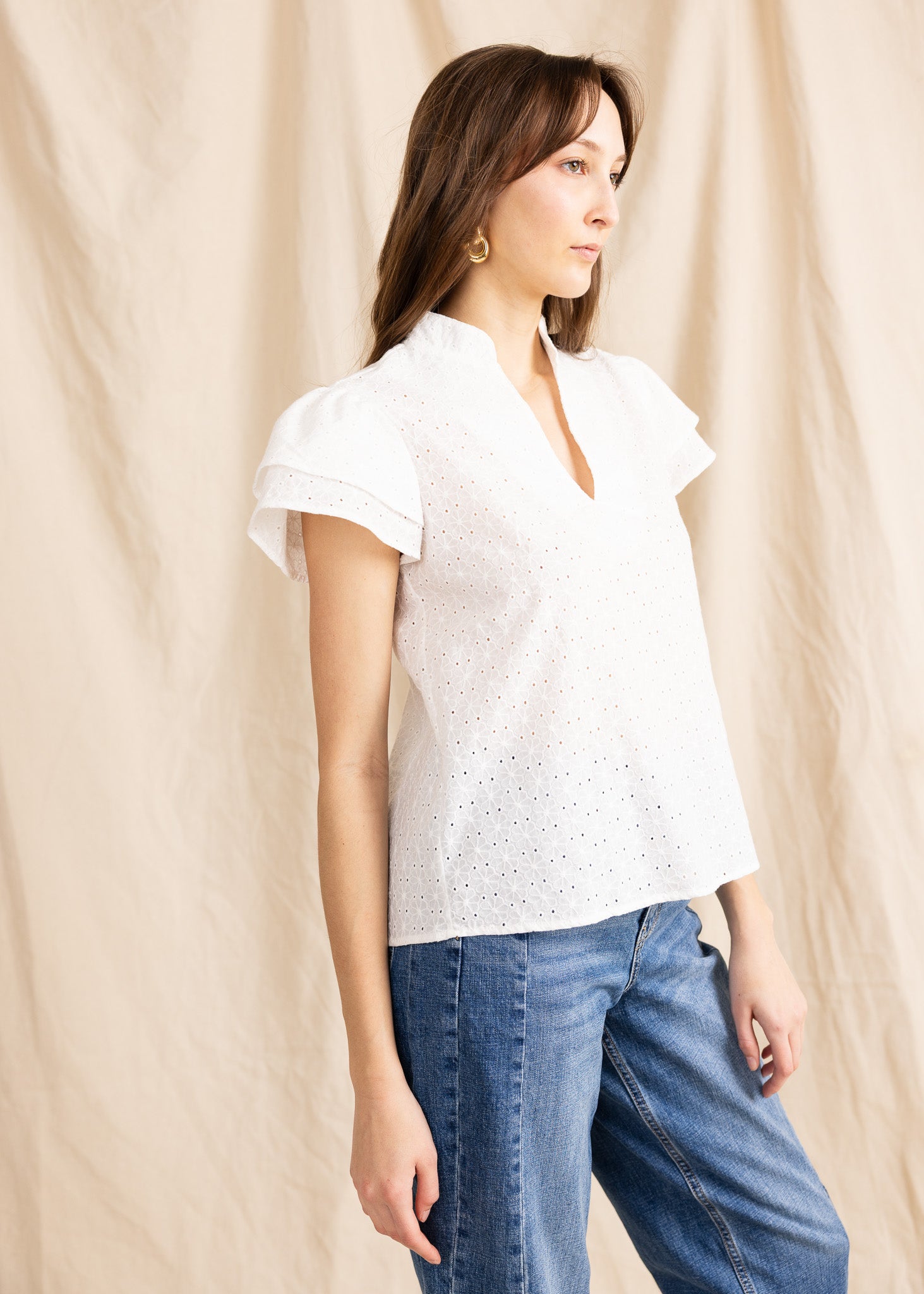Lightweight Yana K georgette top with eyelet detailing and a flowy silhouette, perfect for casual or dressy occasions.