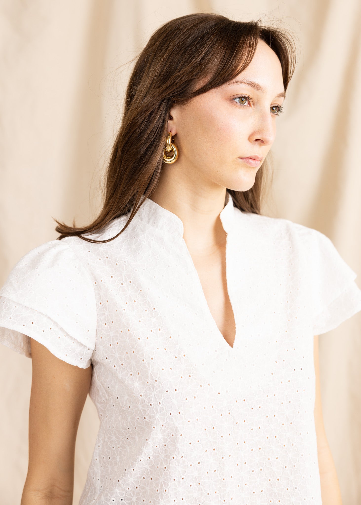 Yana K georgette top with eyelet detailing, featuring a lightweight and flowy design suitable for casual wear.