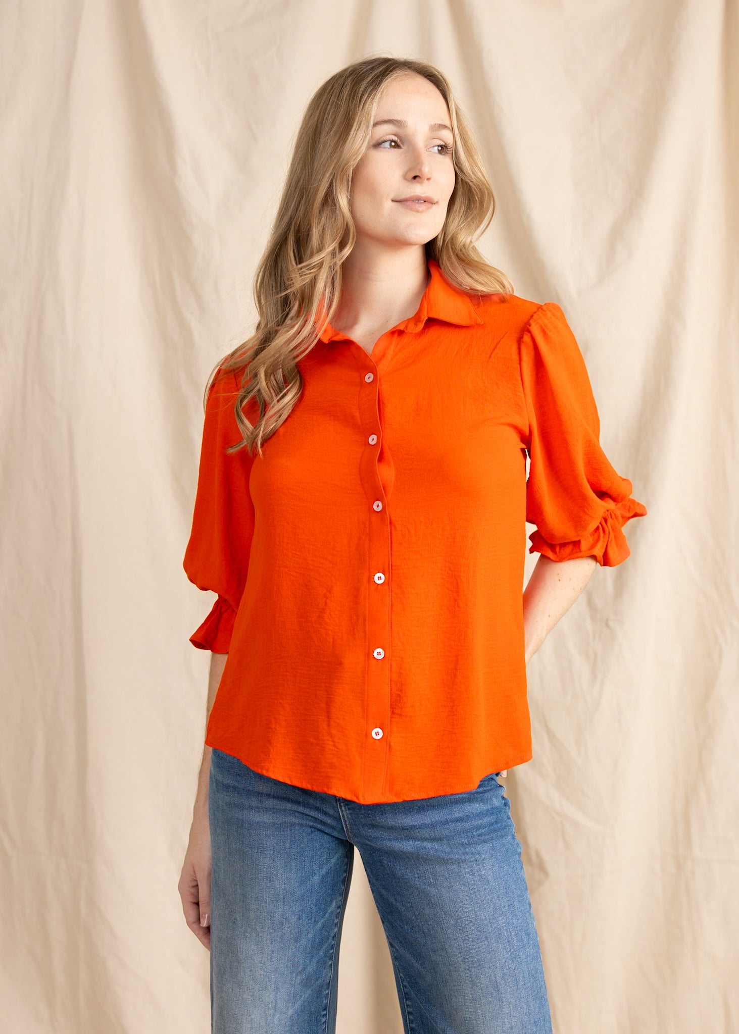 Yana K KESH TOP poly in soft fabric, featuring a relaxed fit and stylish design, ideal for casual wear.