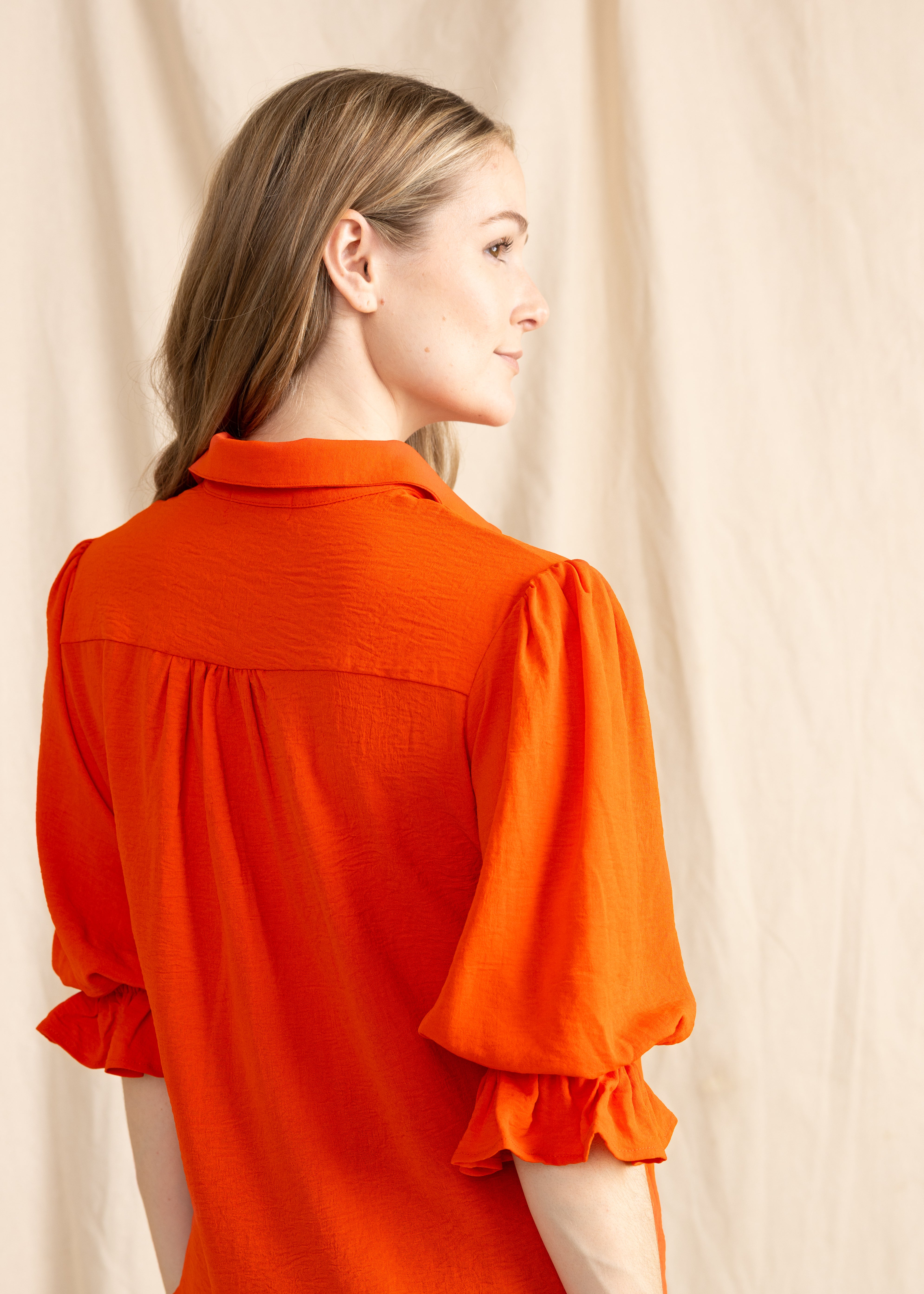 Yana K KESH TOP poly in soft fabric with a relaxed fit and stylish design, ideal for casual wear.