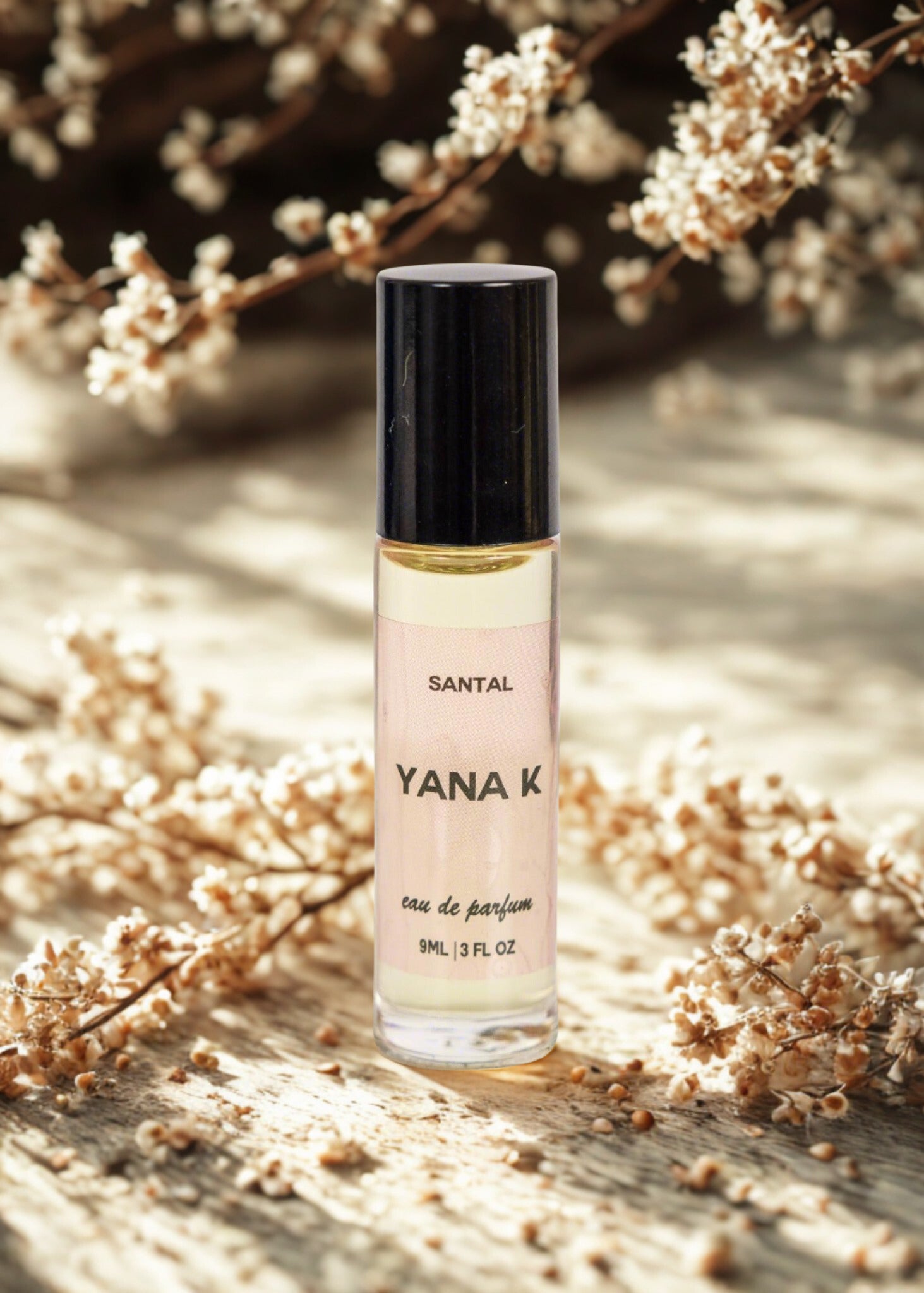 Yana K EAU DE PARFUM SANTAL bottle with elegant design, showcasing warm, woody fragrance notes.