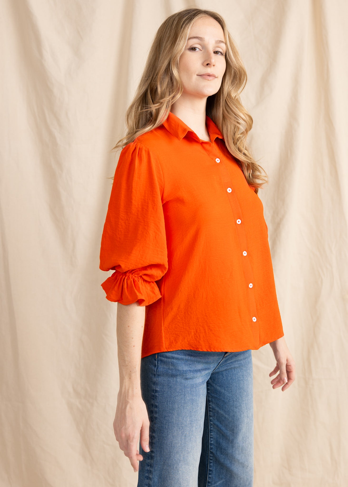 Yana K KESH TOP poly in soft fabric, featuring a relaxed fit and stylish design, perfect for casual wear.