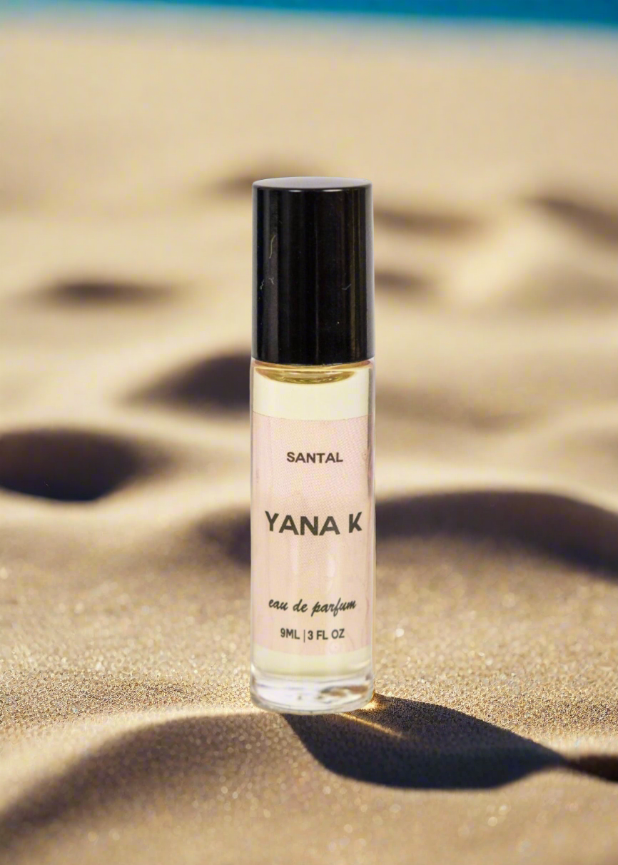 Yana K EAU DE PARFUM - SANTAL bottle with elegant design, showcasing a warm, earthy scent in a sleek glass container.