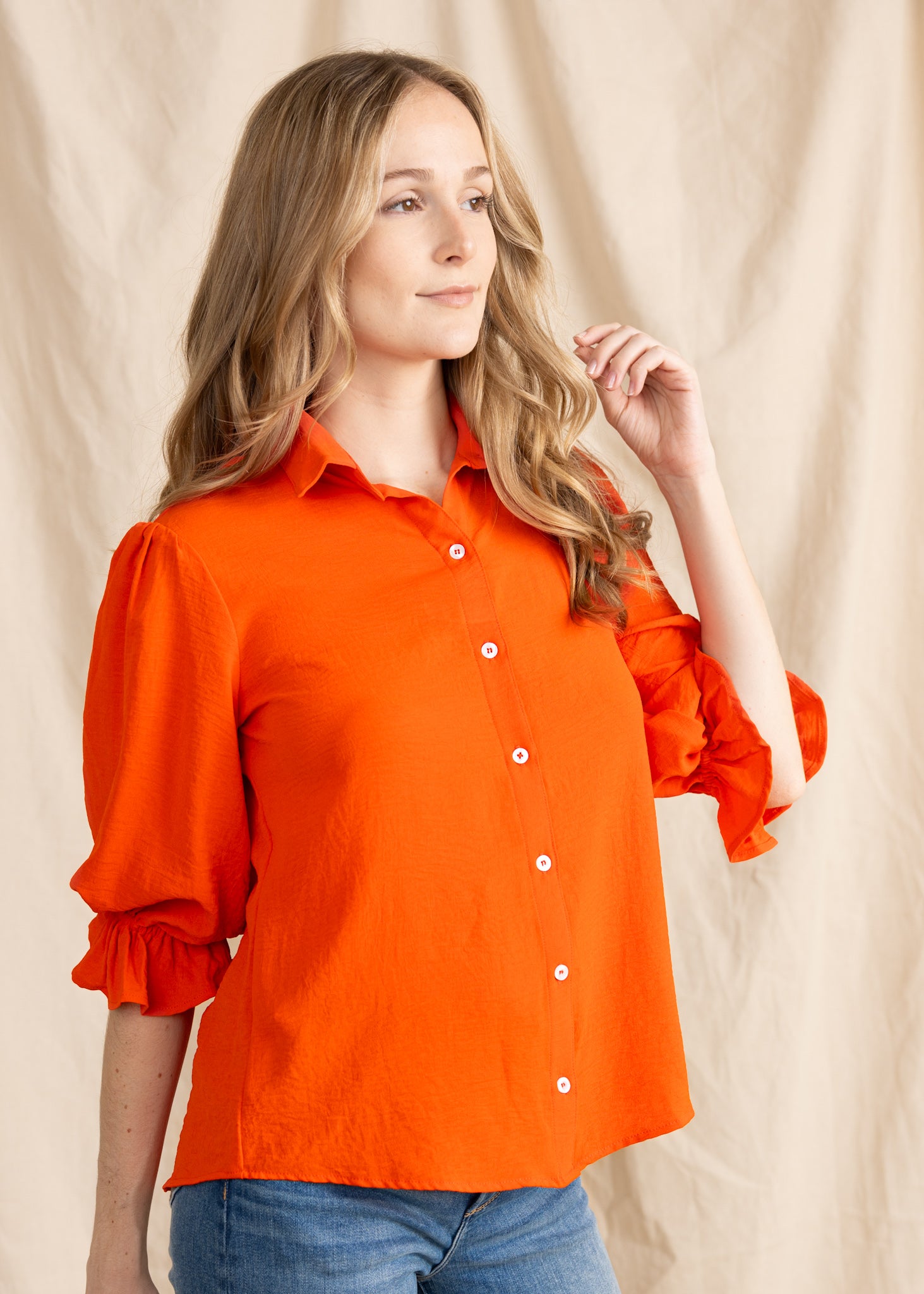 Yana K KESH TOP poly in soft fabric, featuring a relaxed fit and stylish neckline, perfect for casual wear.