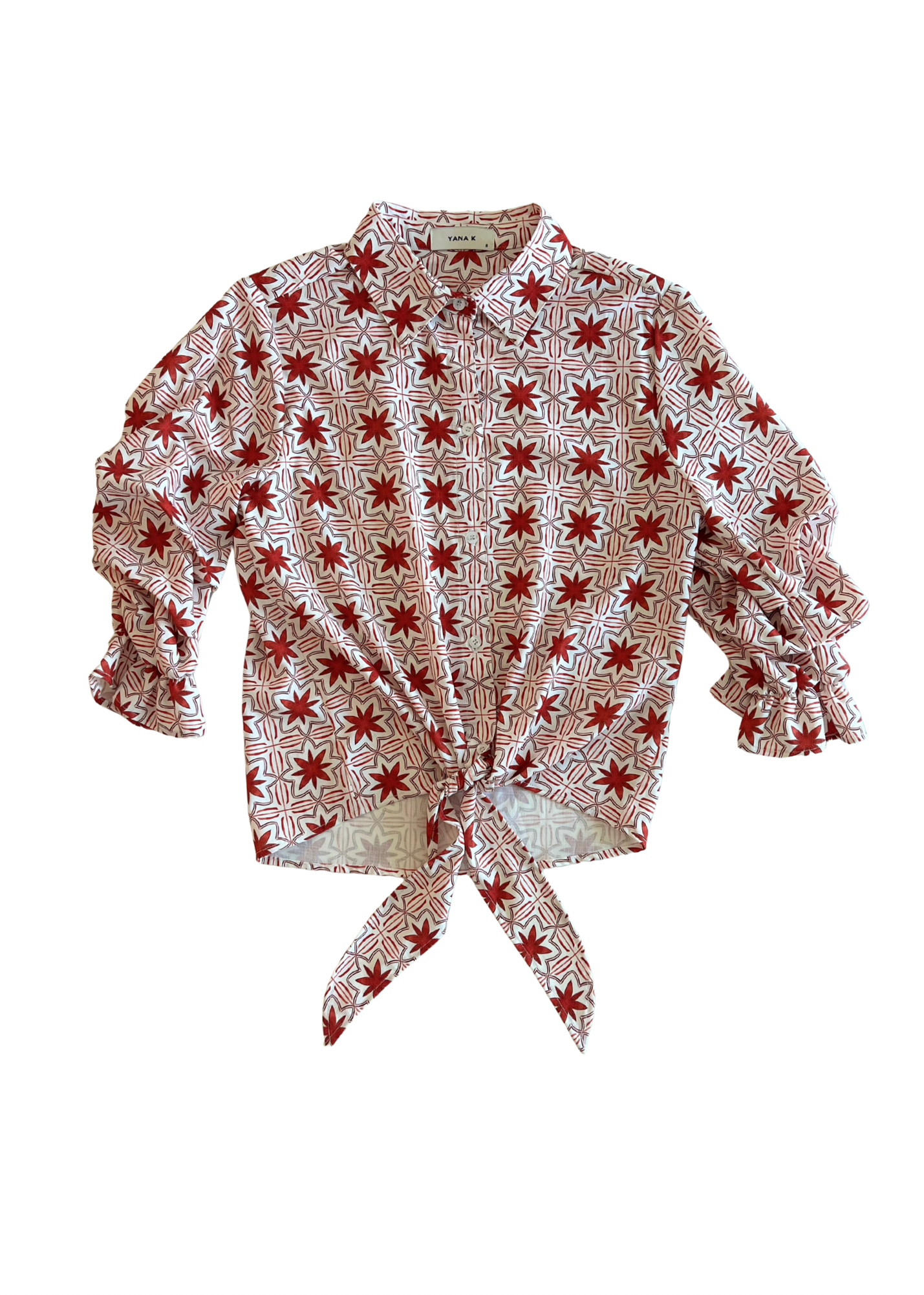 Yana K ZAURI TOP print featuring a vibrant floral design and a relaxed silhouette for casual wear.