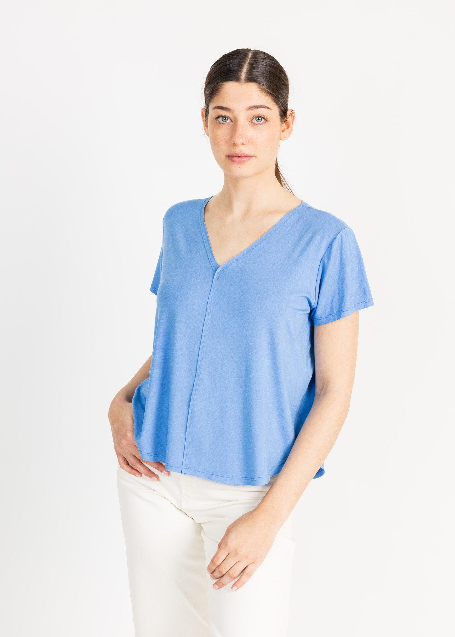 Classic v-neck top with raw edge front and short sleeves in a range of sophisticated colors.