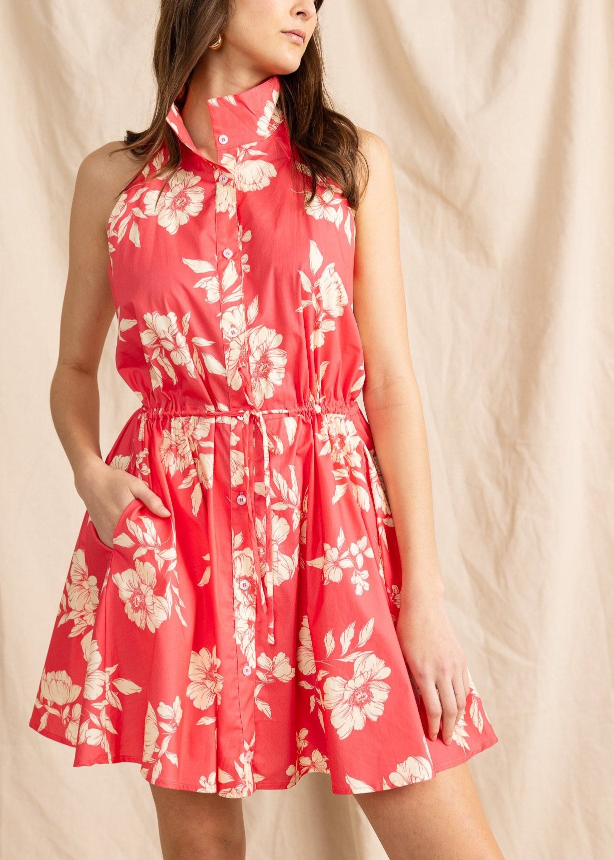 YanaK Hilton dress featuring a vibrant floral print and elegant silhouette, perfect for spring and summer occasions.