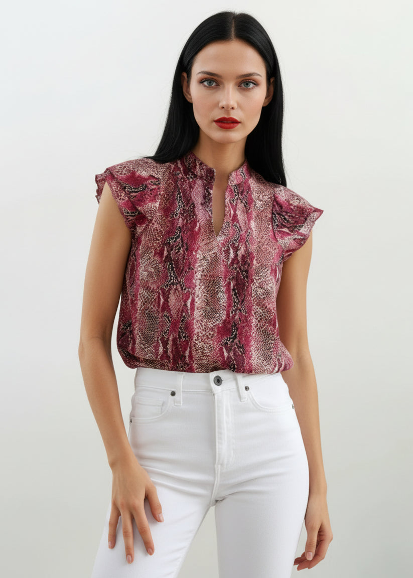 Red snakeskin georgette top by Yana K, featuring a flowy silhouette and stylish design.