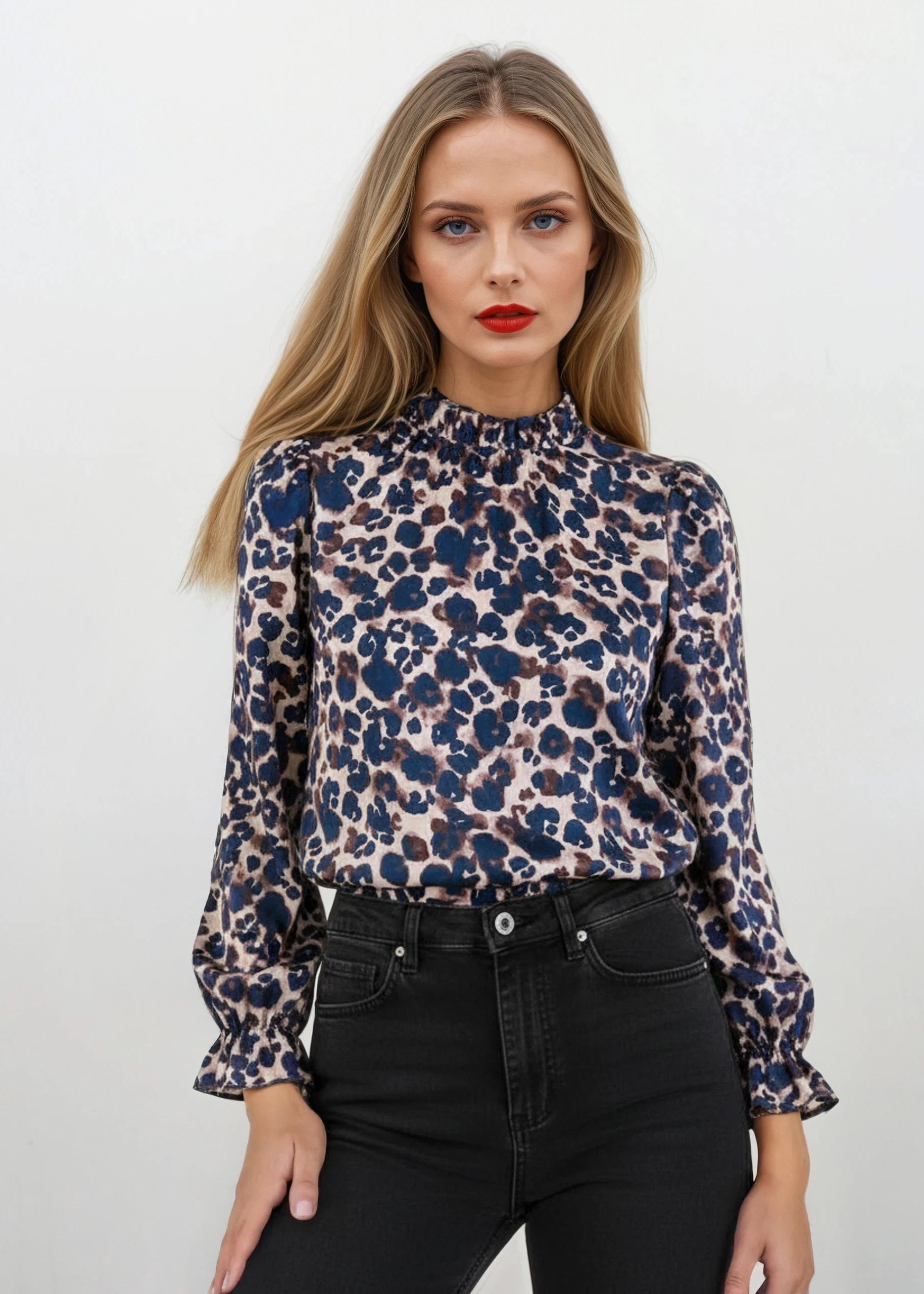 Yana K COLETTE top print featuring a vibrant floral pattern and a relaxed fit, perfect for casual wear.