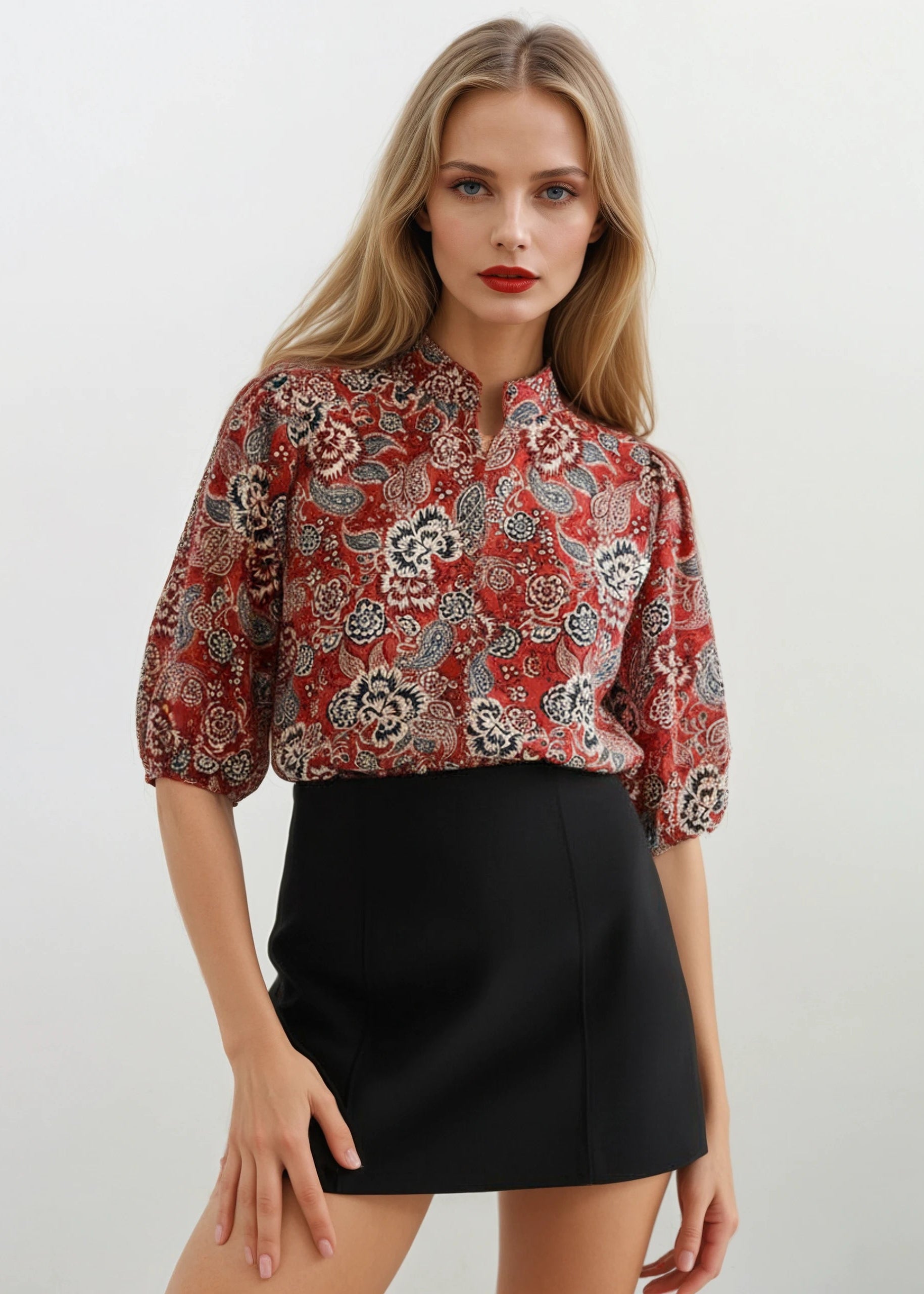 YanaK SASHA F25 blouse featuring a colorful print design, with a relaxed fit and short sleeves.