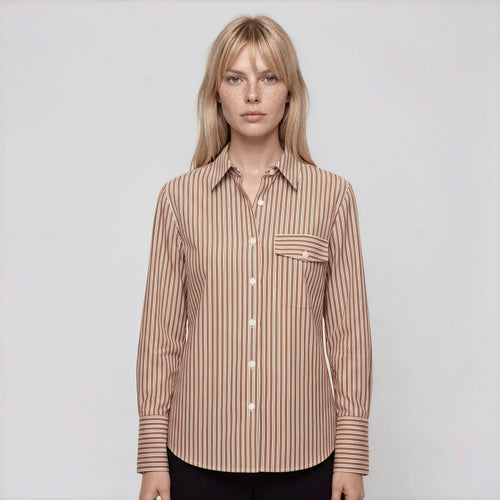 Woman wearing a brown striped shirt on a white background